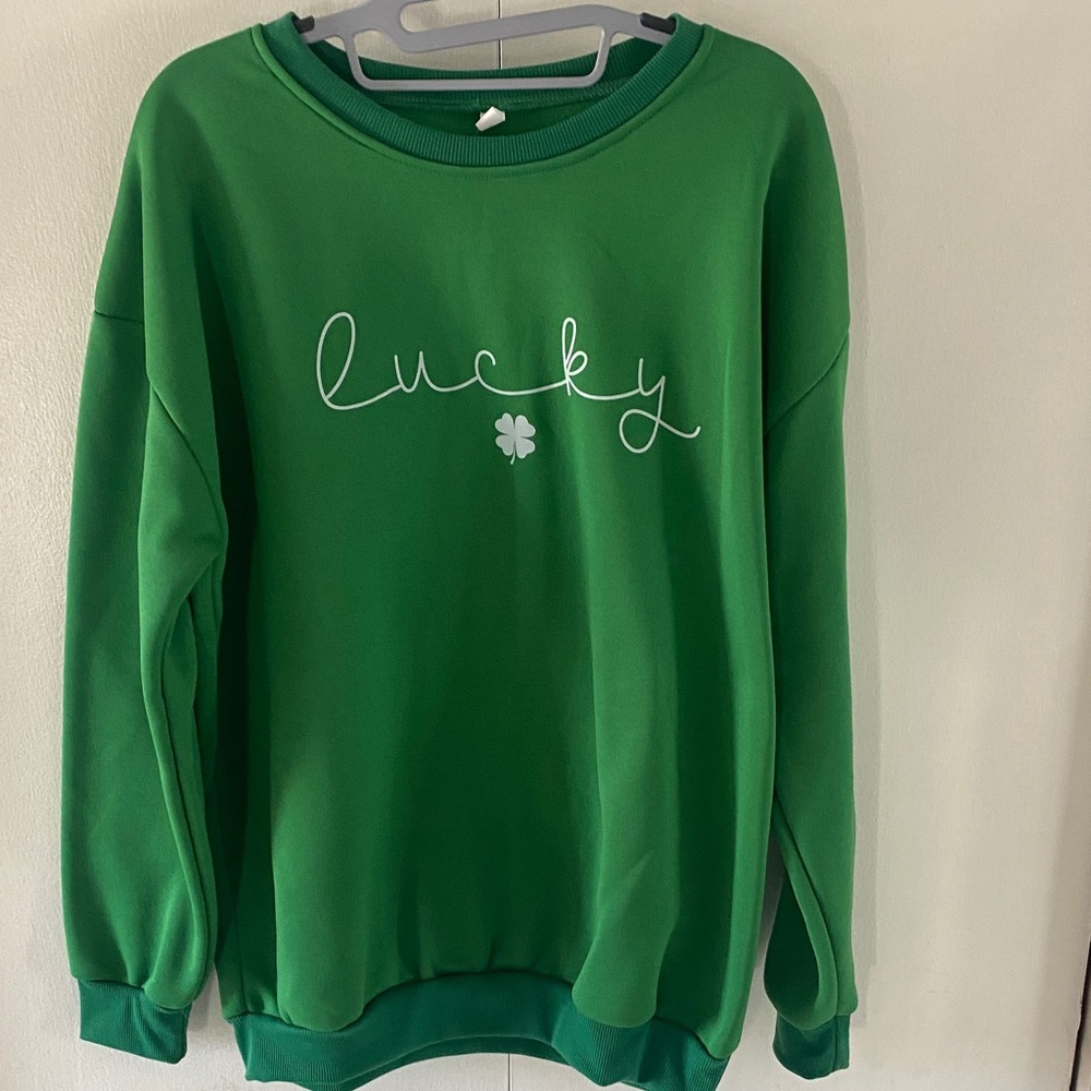 Green Women's “Lucky Shamrock” Crew Neck Sweatshirt for St. Patrick’s Day.